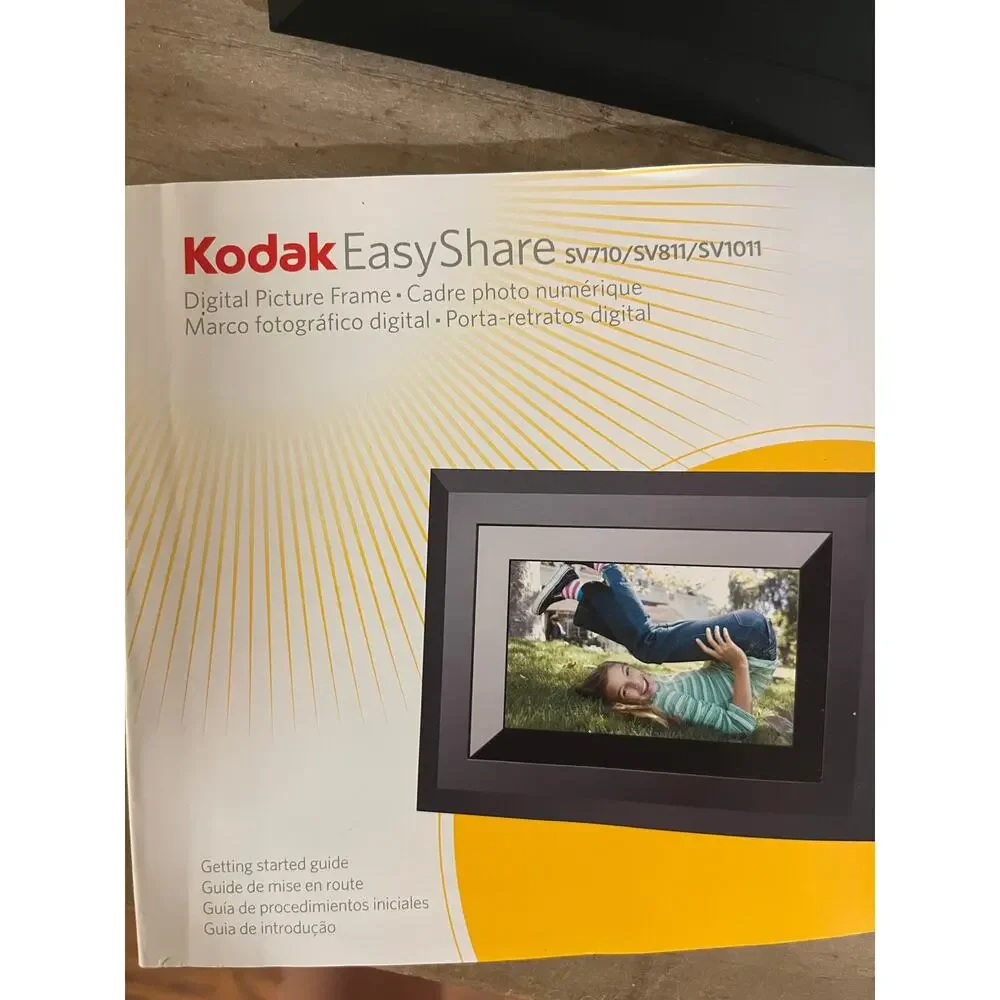 Kodak easy share 8” digital picture frame new. Includes memory card‎ & remote